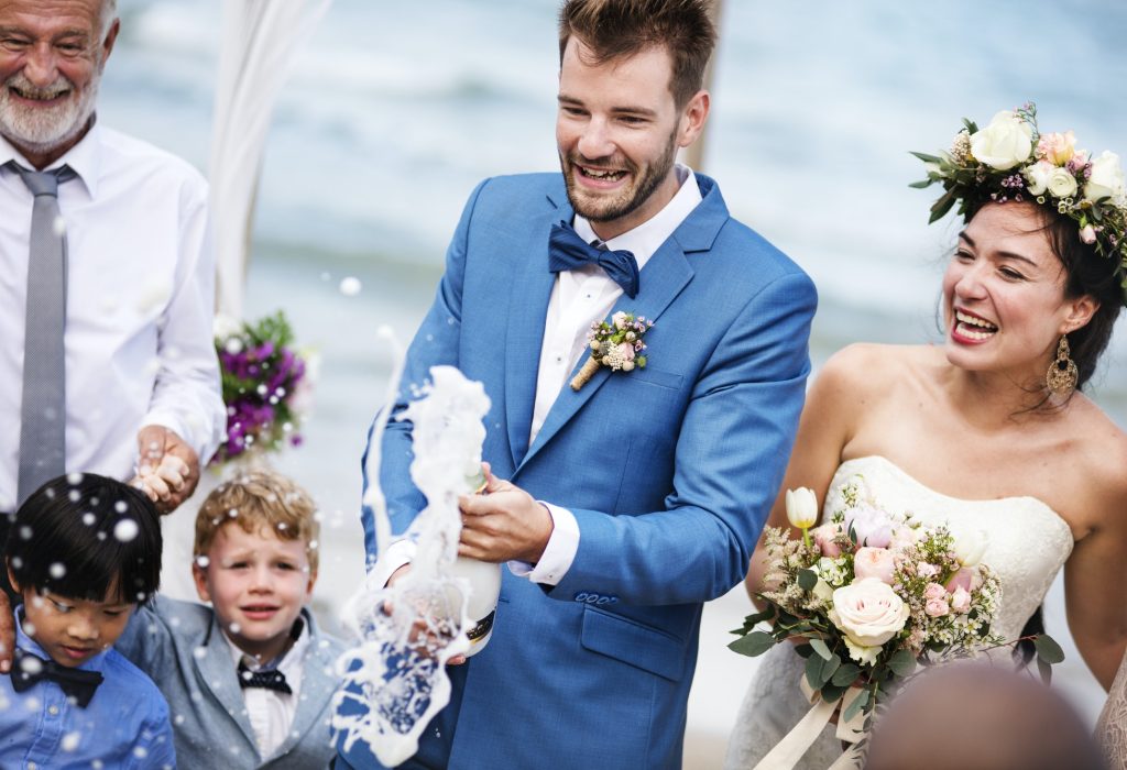 young-couple-in-a-wedding-ceremony-at-the-beach.jpg young-couple-in-a-wedding-ceremony-at-the-beach.jpg